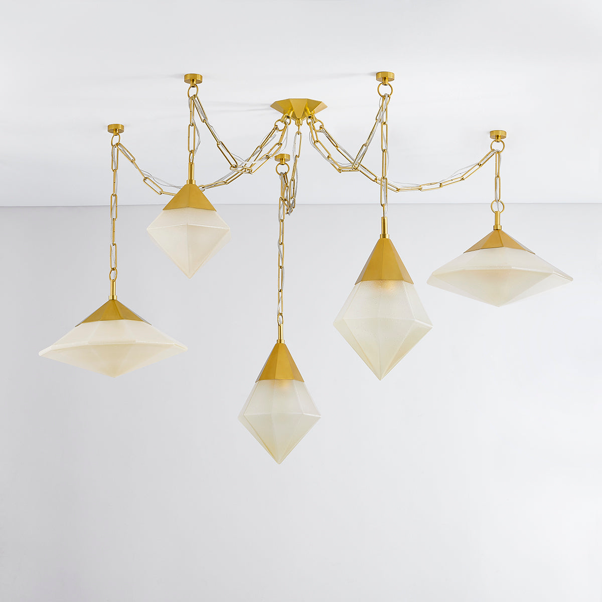 Angelique 5-Light Linear Pendant – Vintage Polished Brass with Champagne Seeded Glass