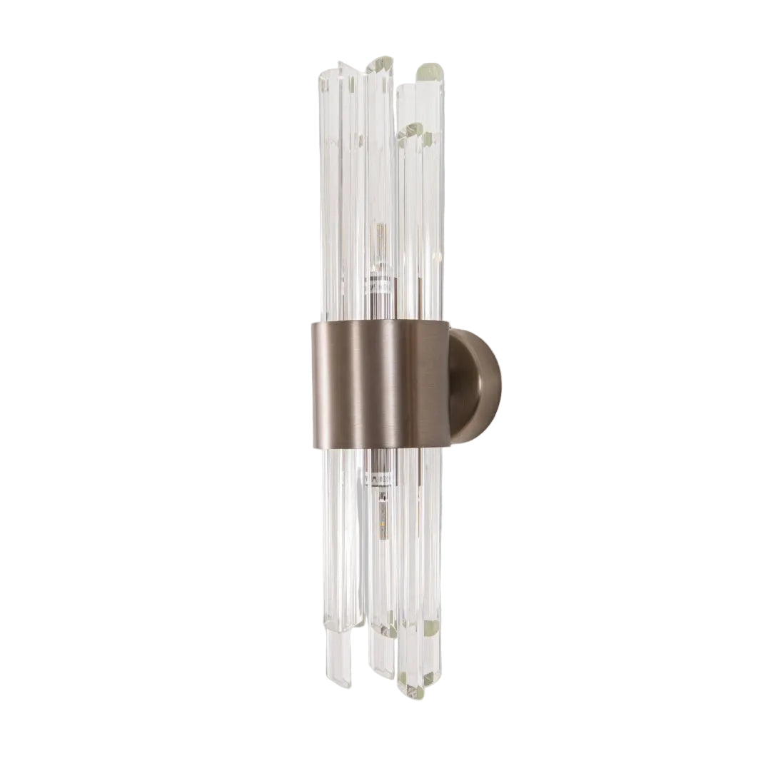 A chic and contemporary wall lamp with a brushed bronze finish, featuring clear glass accents and a sleek design.