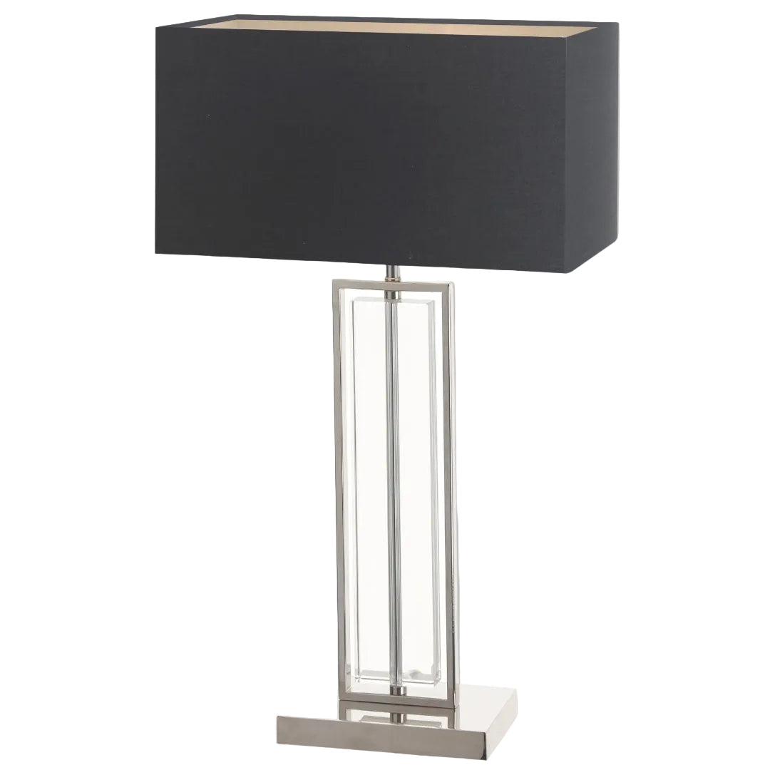 A sleek modern table lamp with a polished nickel base and a contrasting white fabric shade.