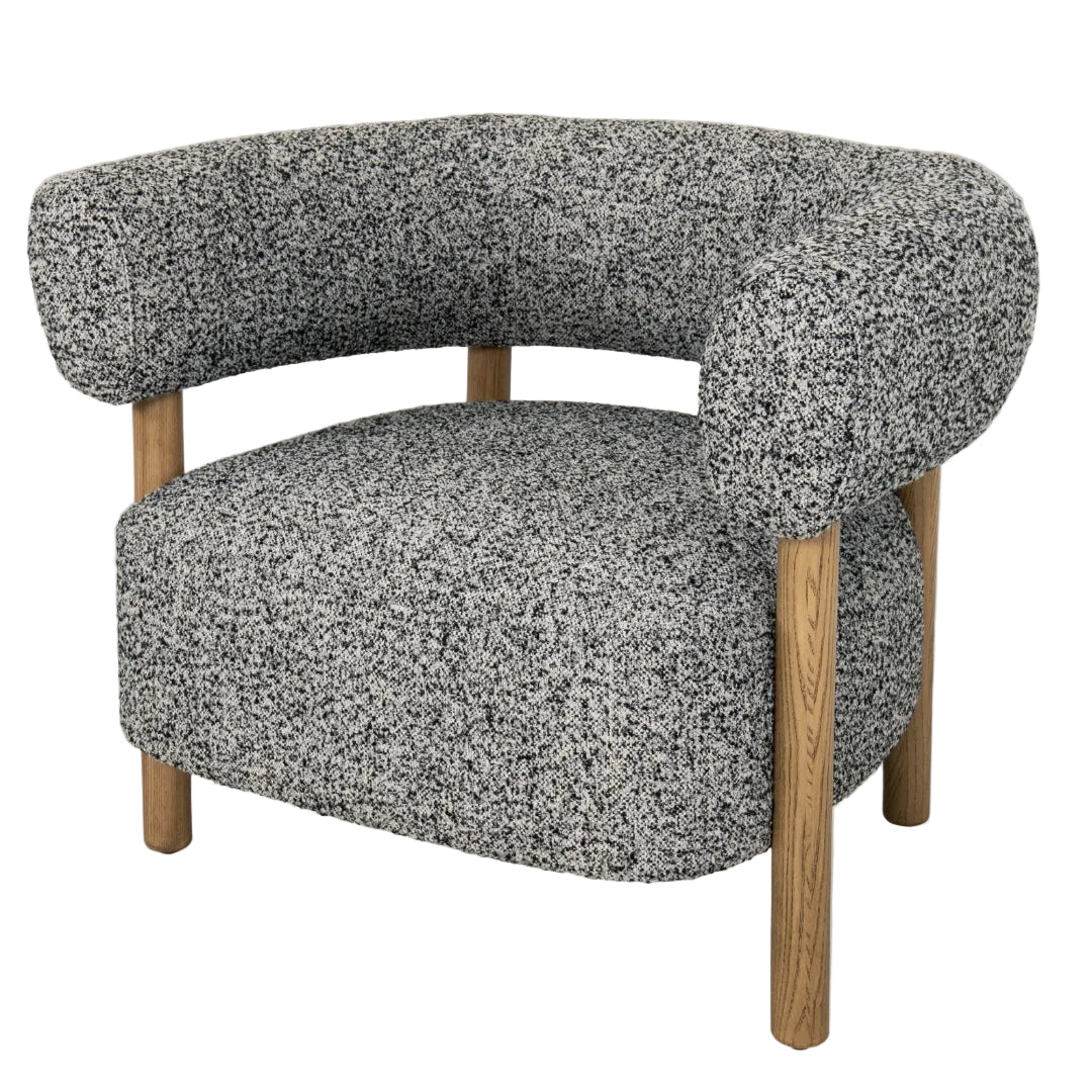 An elegant Cassius Chair with wooden legs and textured grey fabric upholstery.