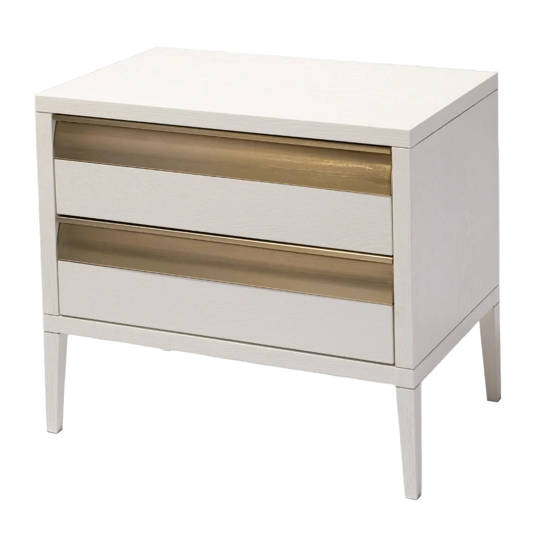 A sleek white veneer side table with two drawers featuring antique brass detailing, on slender legs.