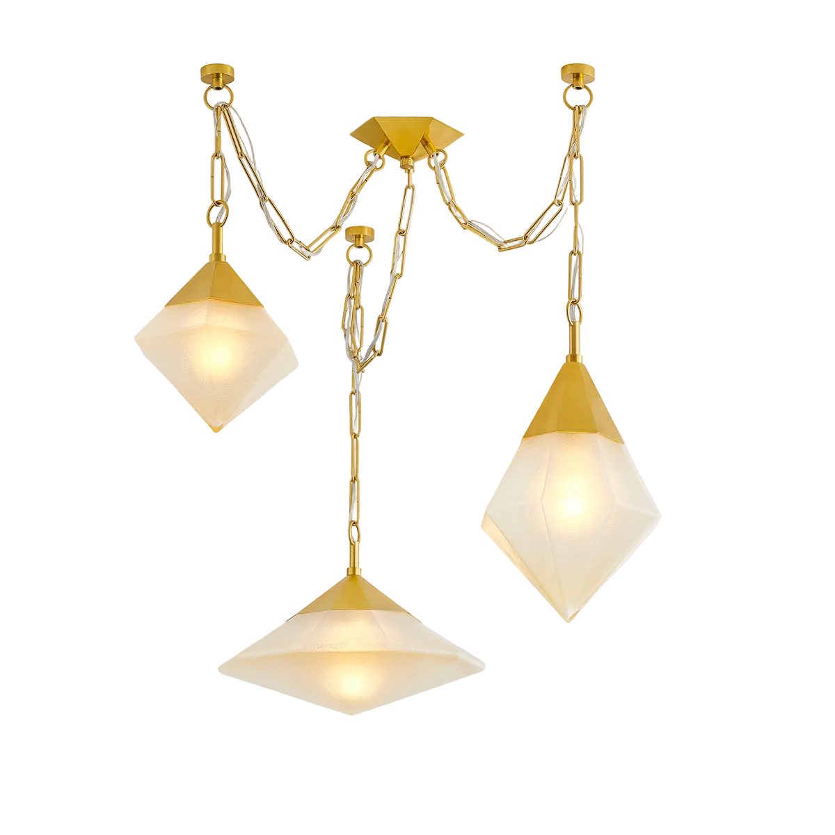 A vintage polished brass linear pendant light with champagne seeded glass shades, hanging in a triangular formation.