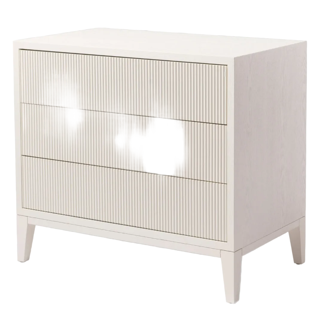 A white Aster 3 Drawer Chest with a sleek design, featuring three drawers and wooden legs.