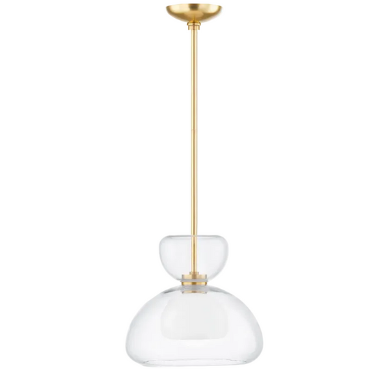 A modern pendant light fixture with a brushed gold metal stem and canopy, featuring a clear glass shade with a double-bulb design, shown against a plain white background.